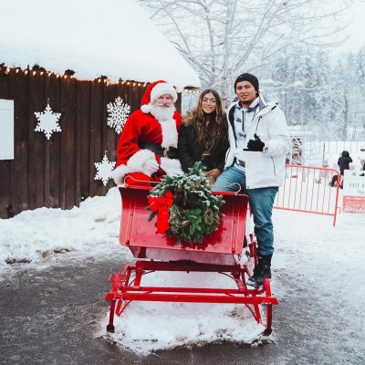 a group of people that are standing in the snow