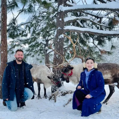a group of people that are standing in the snow