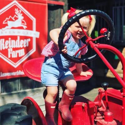 a woman sitting on a bicycle